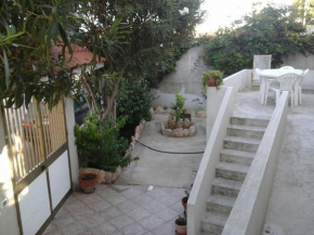 Отель Appartamento con giardino, Lampedusa e Linosa